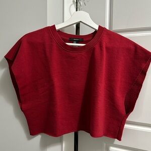 loose sleeveless cut-off style crop top